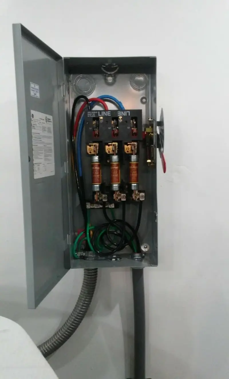 Three-phase disconnect switch installed for Smoke Detector Installation in Traverse City